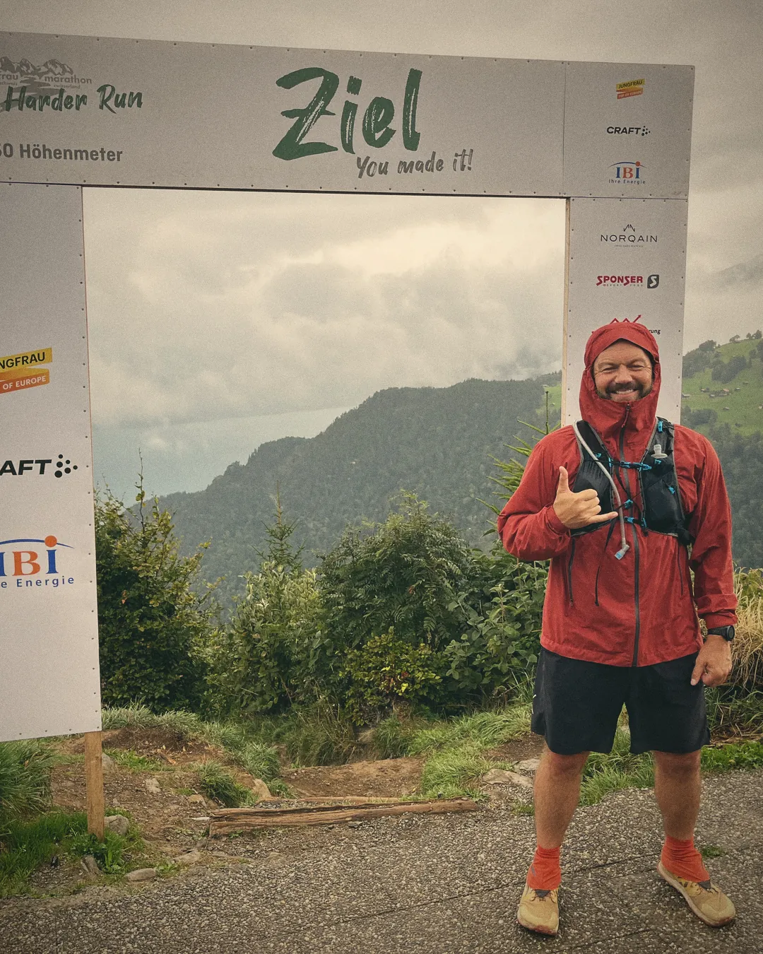 James at the finish arch of a mountain ultra