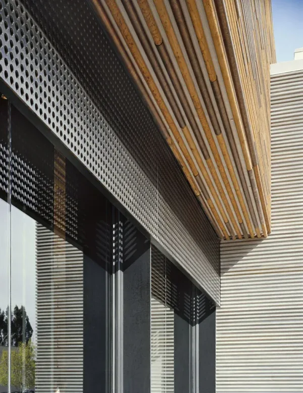Anthropologie Burlingame: perforated metal under a canopy of wood and copper rods