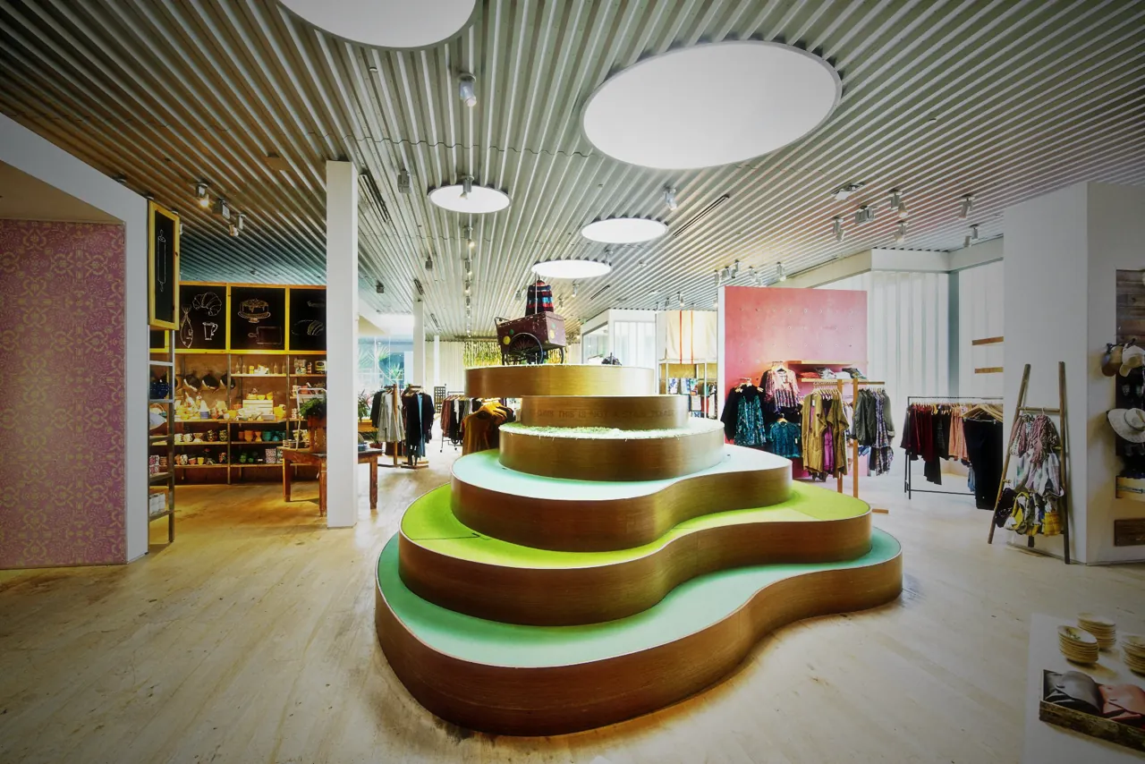 Anthropologie Dos Lagos: a stepped green hill for display under round skylights