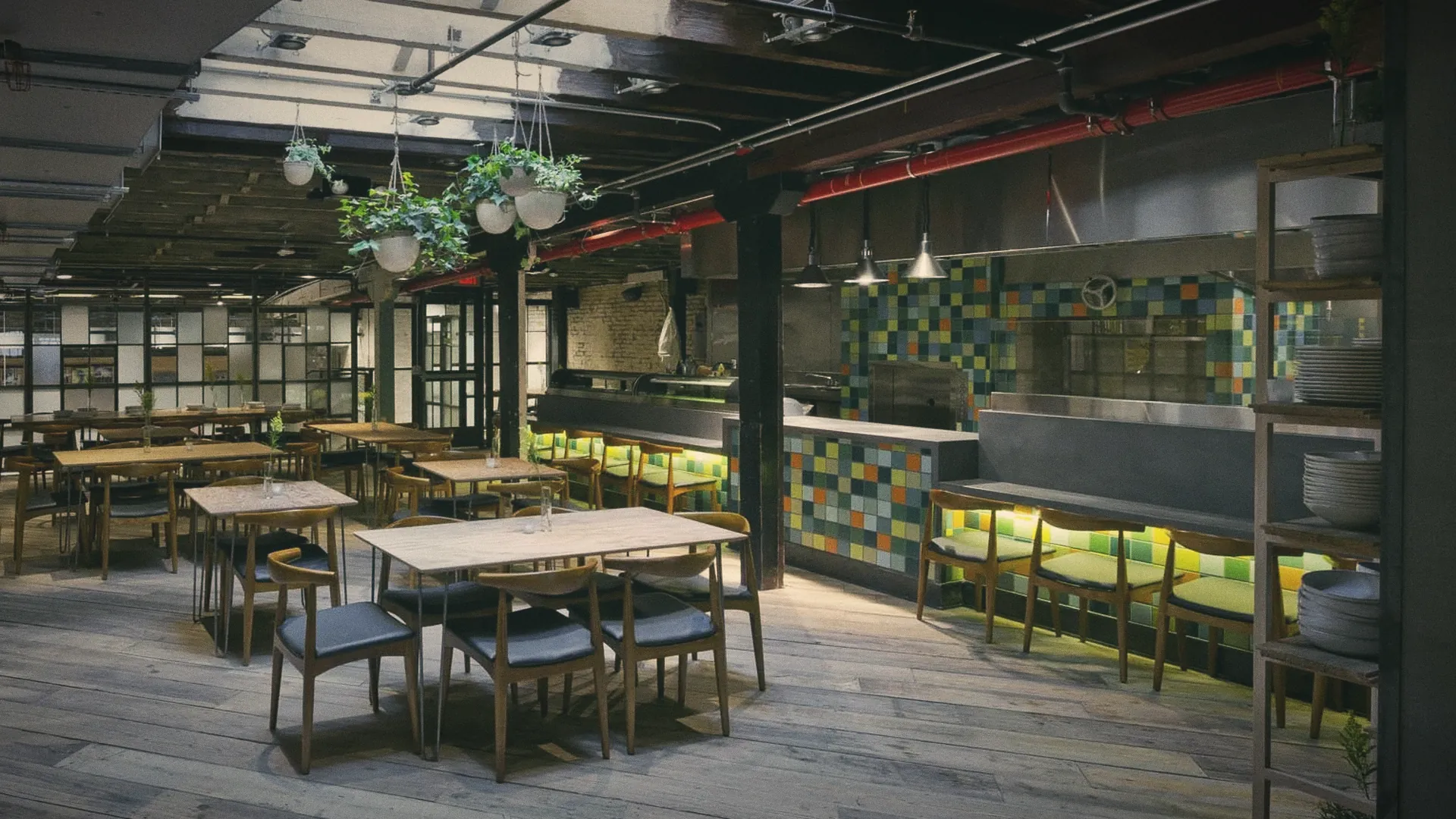 A skylit dining room in a converted warehouse